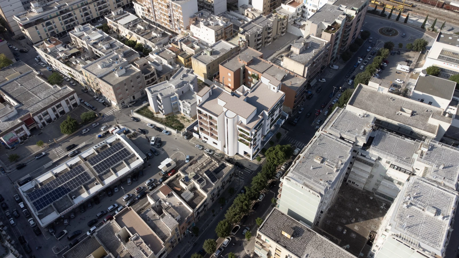 Fotoinserimento aereo del complesso nel quartiere